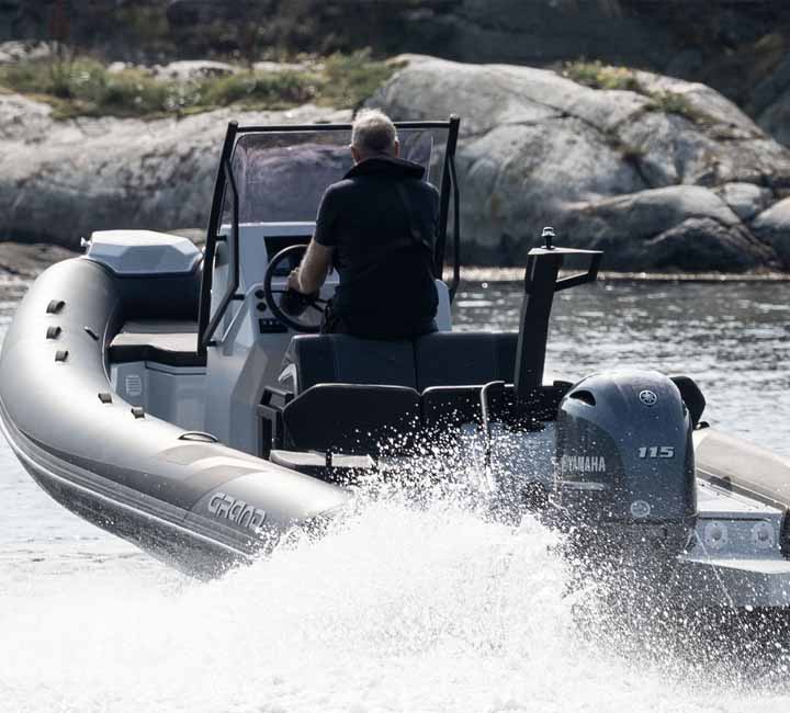 The Grand D600 powered by the Yamaha 115HP engine travelling across the water