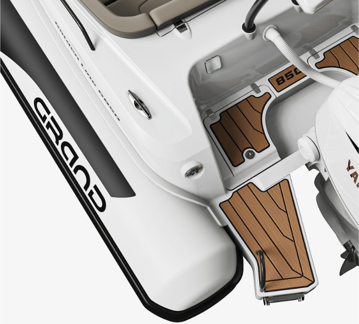 A render visual of the stern step ends of the Grand G850 from above, and the white hypalon tubes