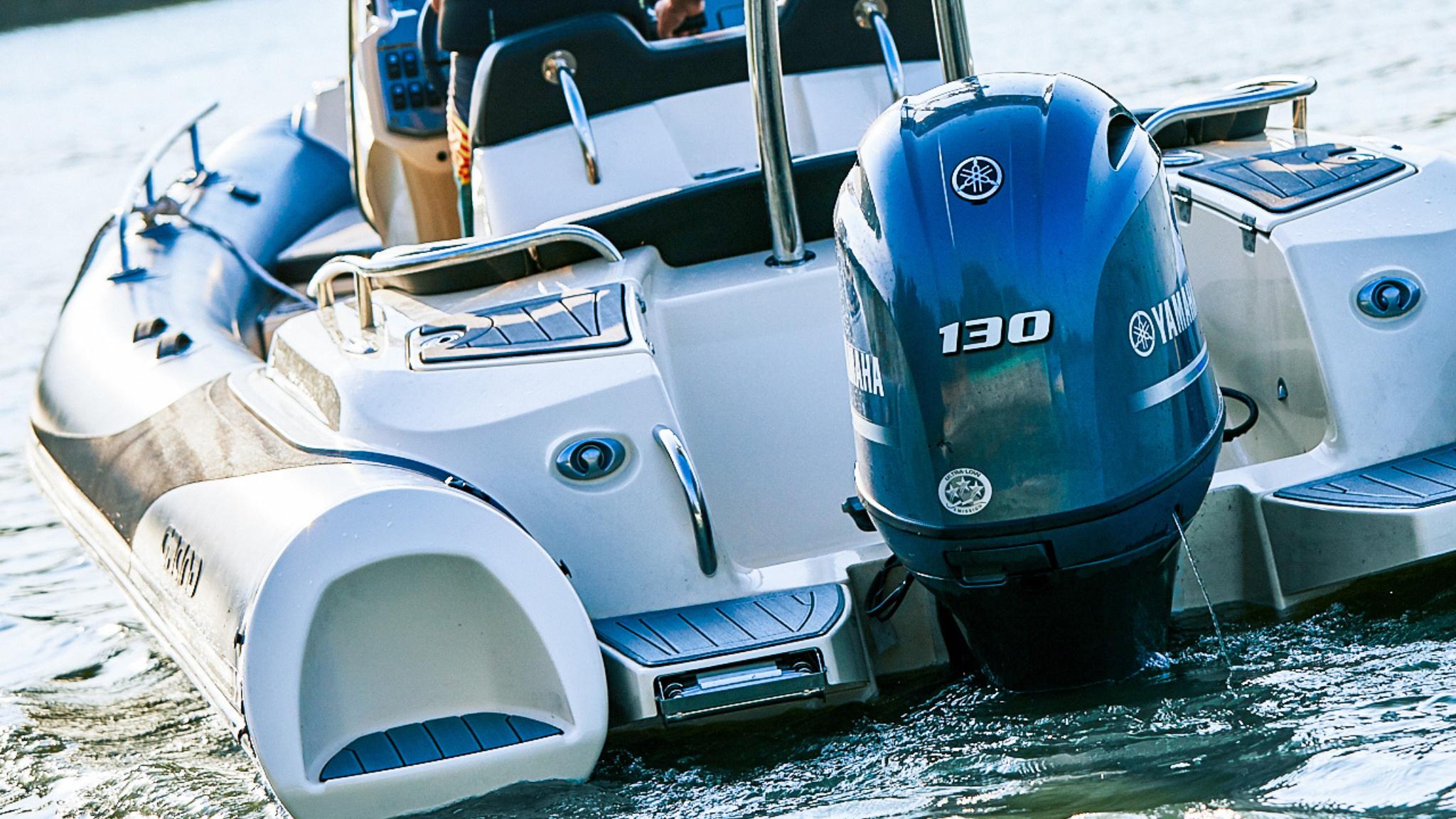 A Yamaha Outboard on the back of a Grand G580 boat