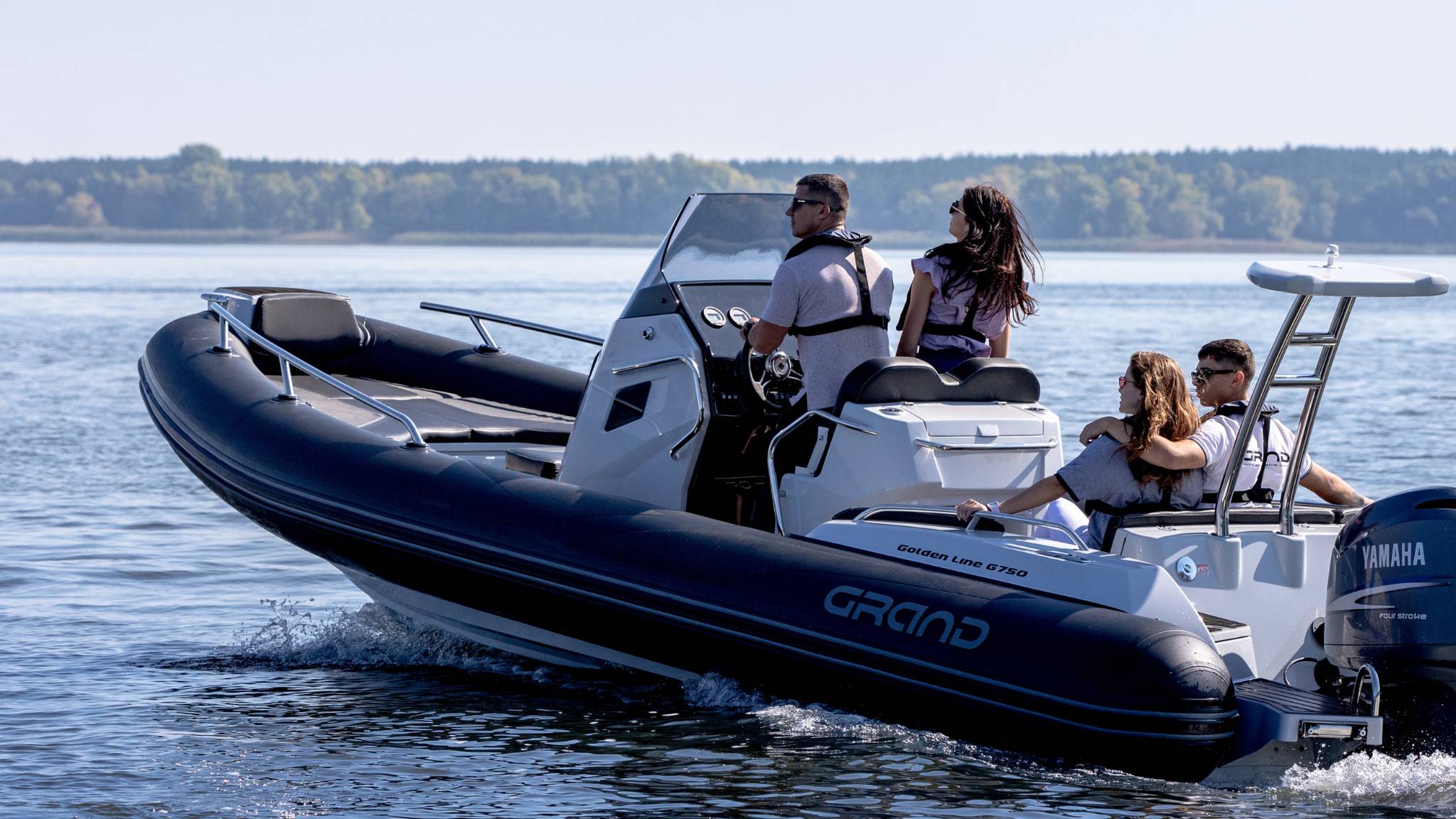 Four passengers onboard the Grand G750 rigid inflatable boat