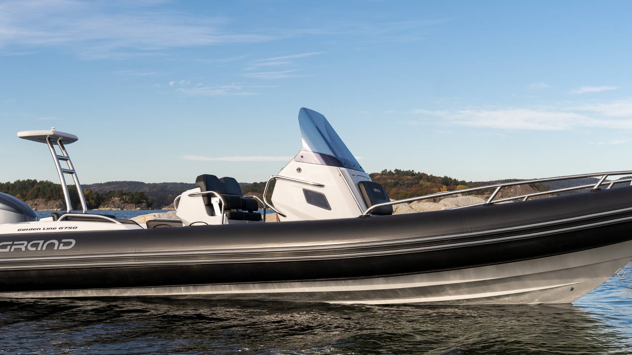 A Grand G750 rigid inflatable boat sat on the water