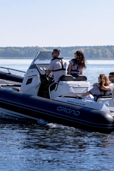 Four passengers onboard the Grand G750 rigid inflatable boat