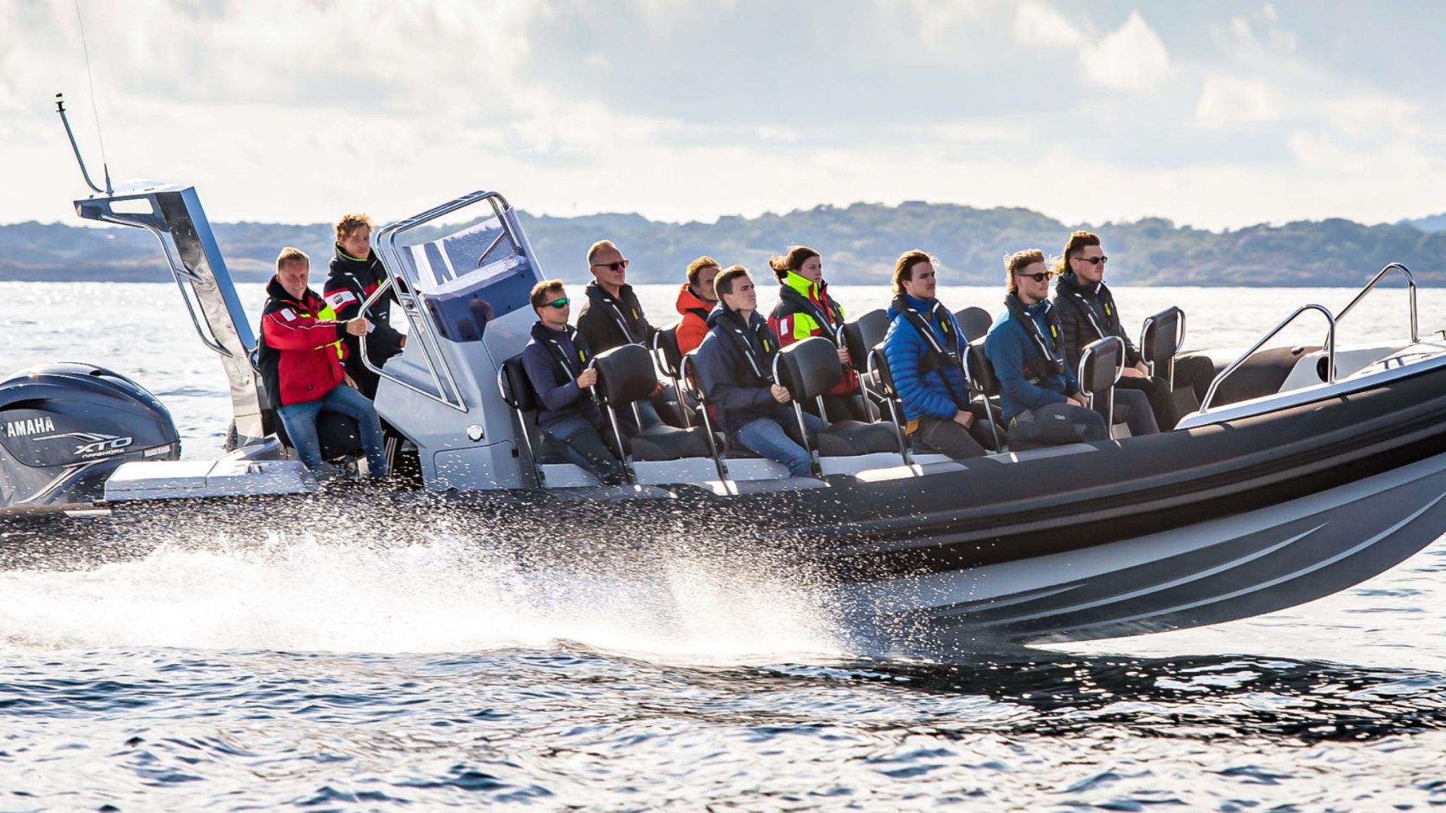 Grand D950 commercial RIB boat on the water with numerous passengers on board