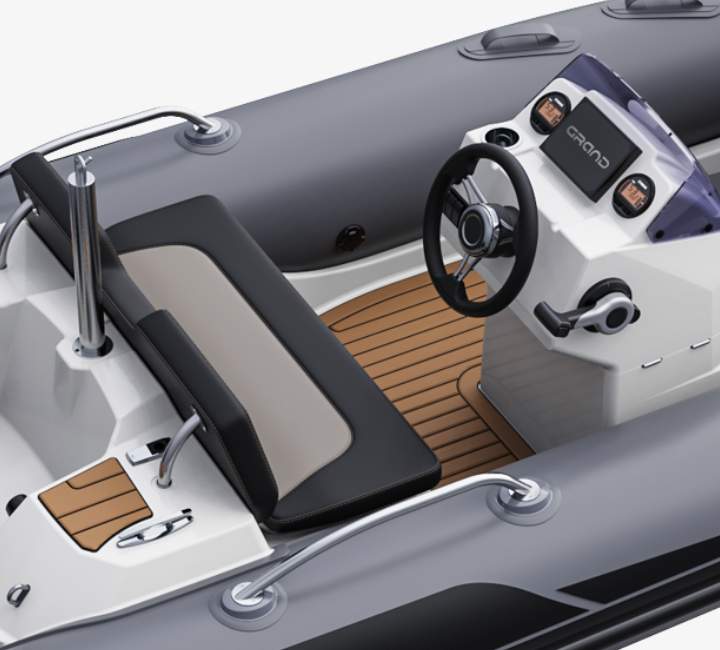 A render image of the Grand G380 tender boat with helm seat and console