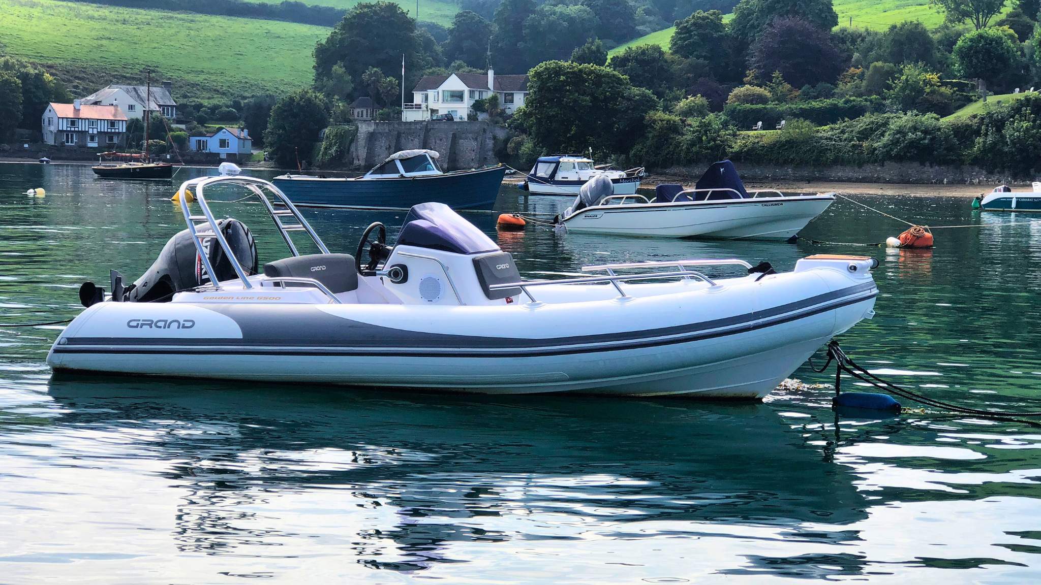 A Grand G500 boat moored on the water