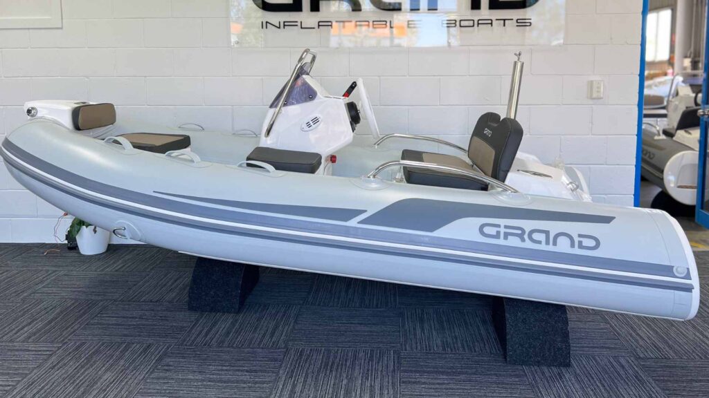 Light grey Grand G340 tender boat for sale with ski pole