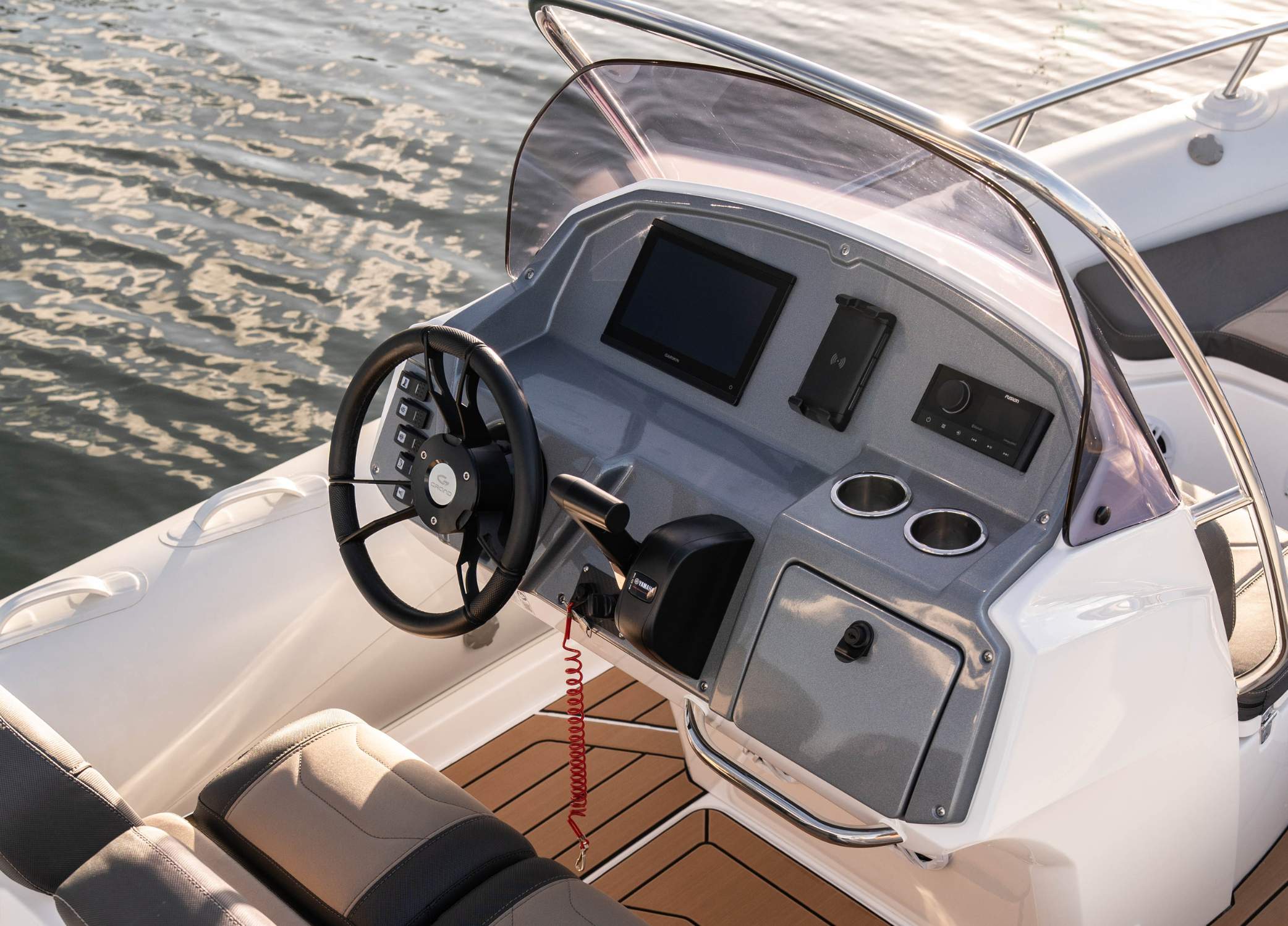 Console on Grand G580 with Garmin Chart Plotter and Scanstrut Phone Charger