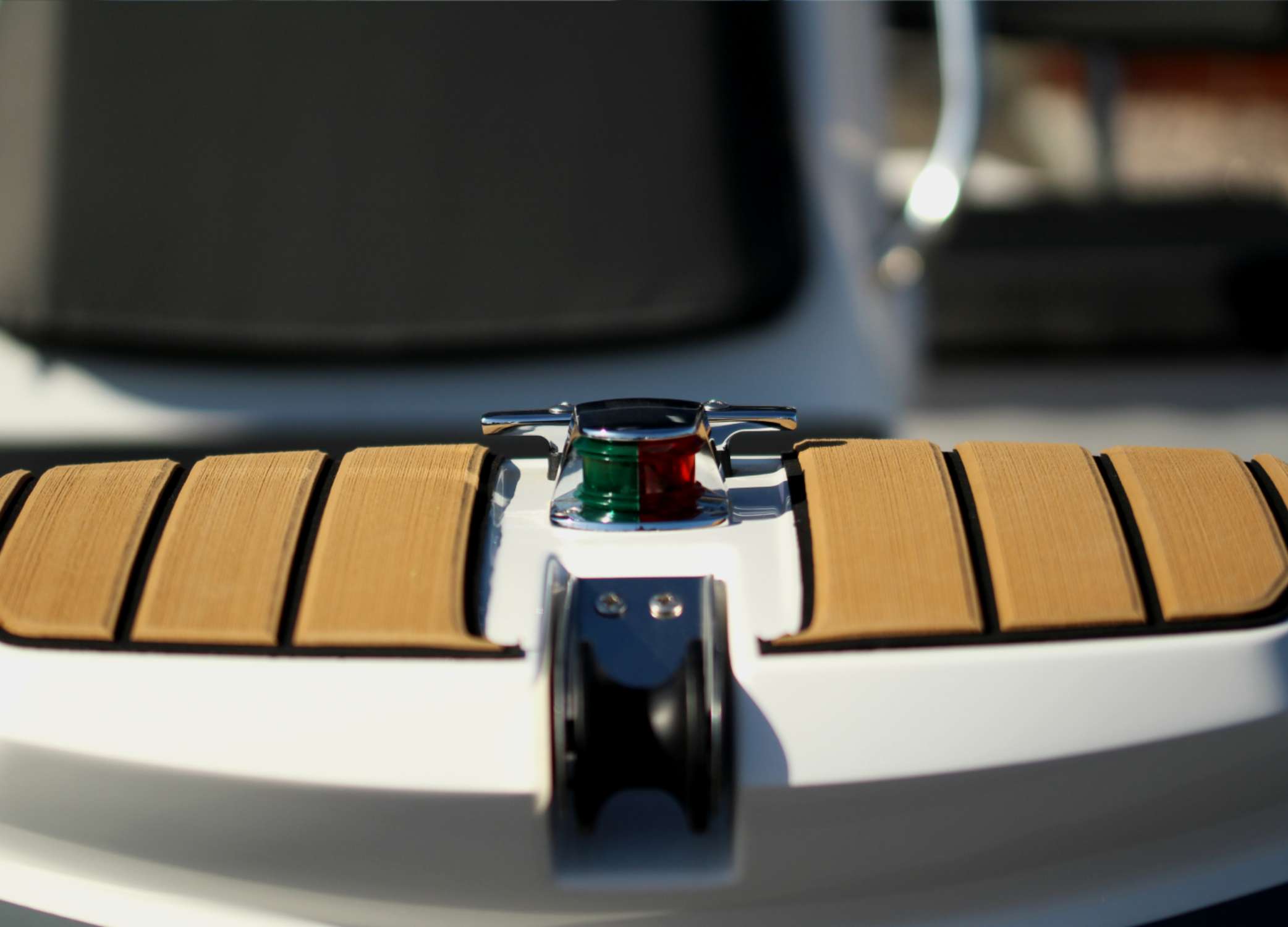 Close up of the bow step plate and anchor roller on the Grand S470