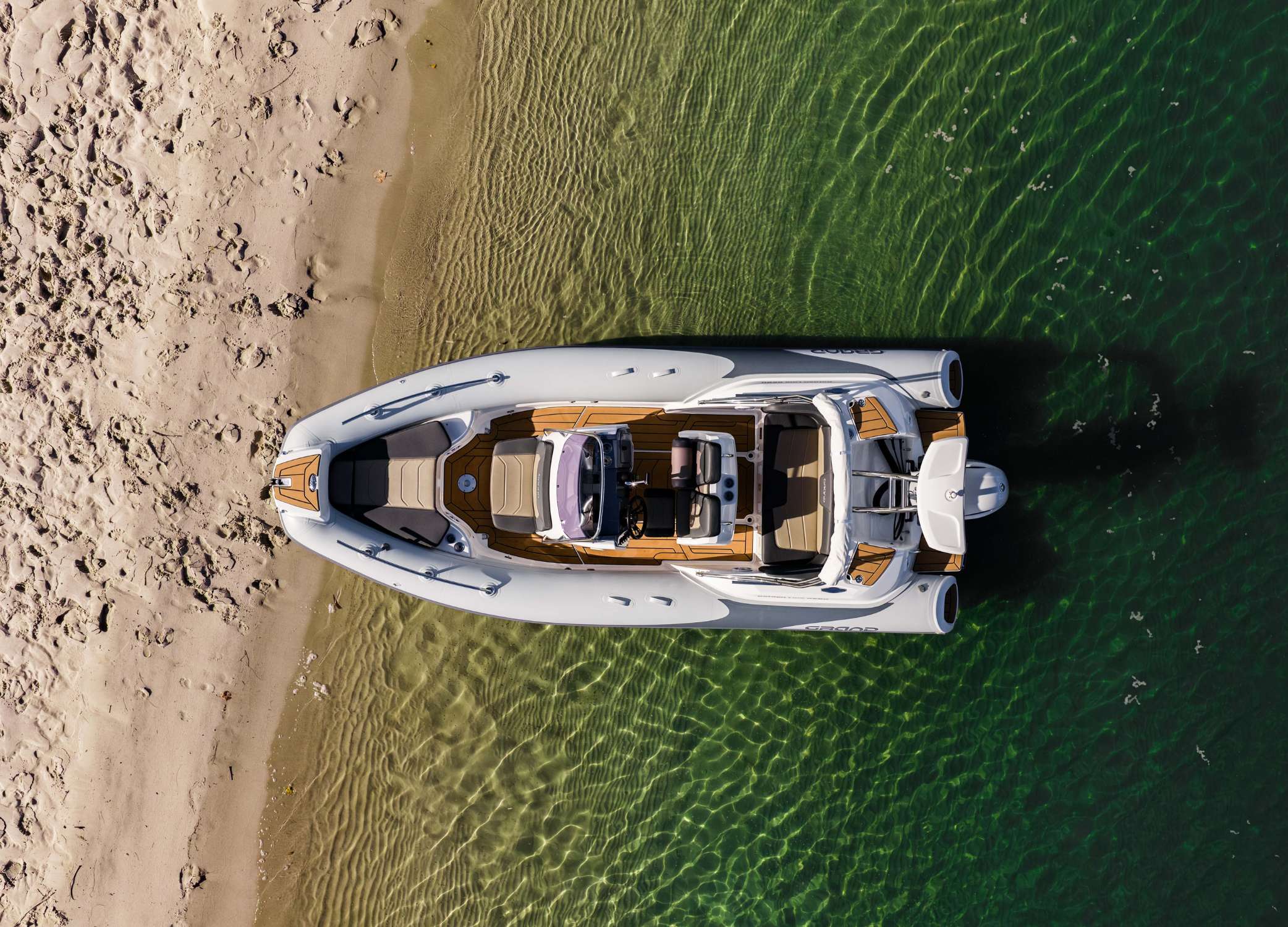 Grand G580 rigid inflatable boat on the beach