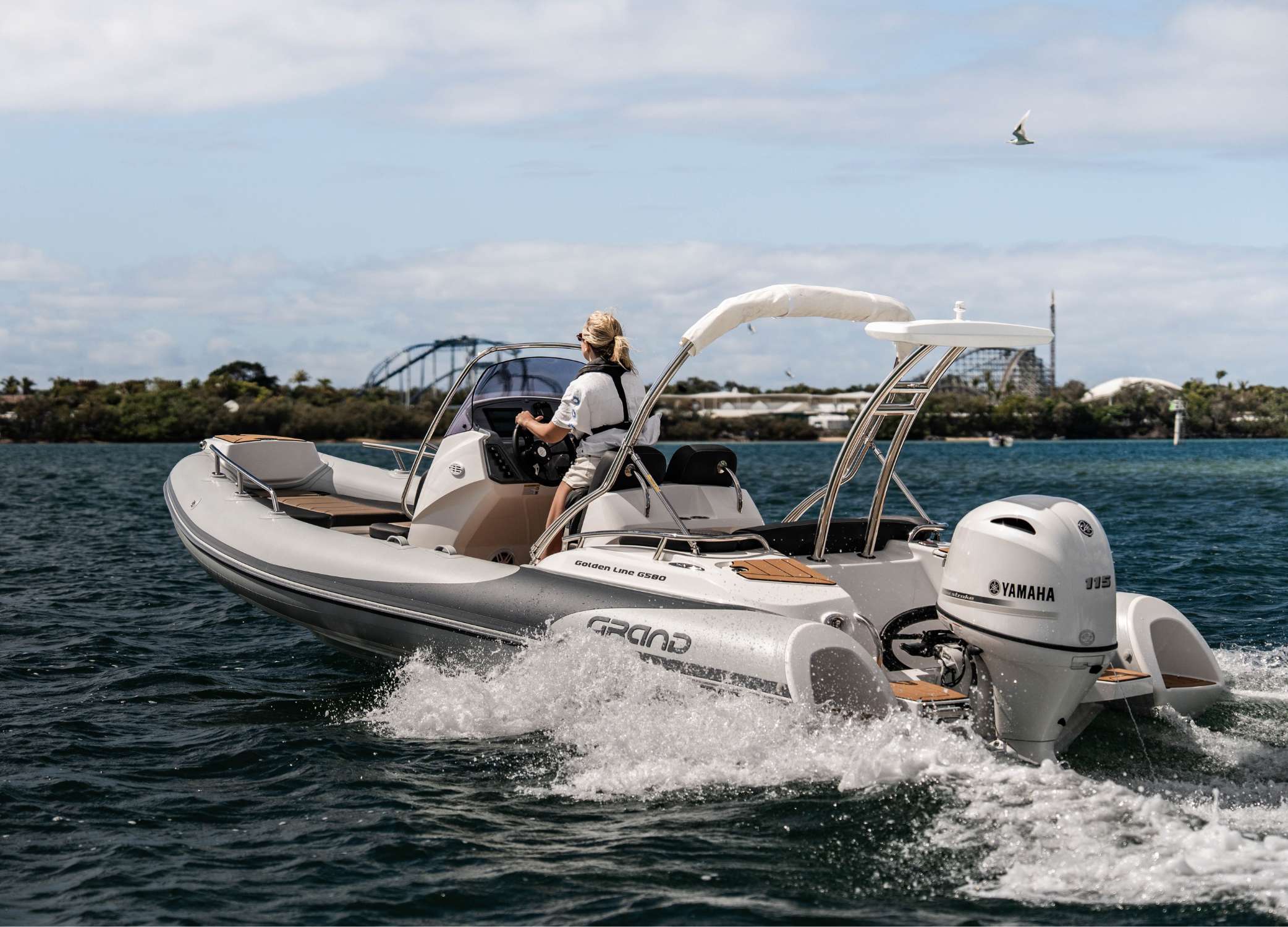 Woman driving a 5.8 metre rigid inflatable boats