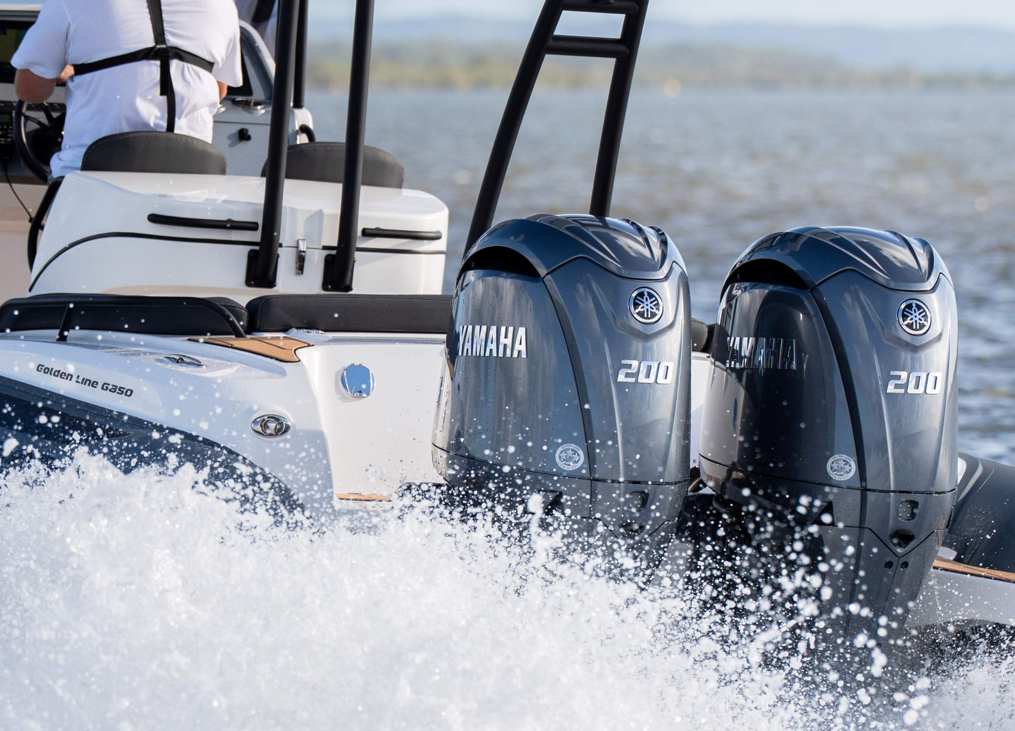 Twin 200HP Yamaha Outboards on the back of a Grand G850 rigid inflatable boat