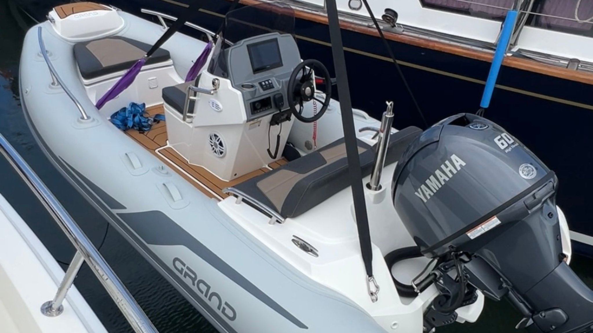 Grand G420 light grey inflatable tender boat onboard a Riviera yacht