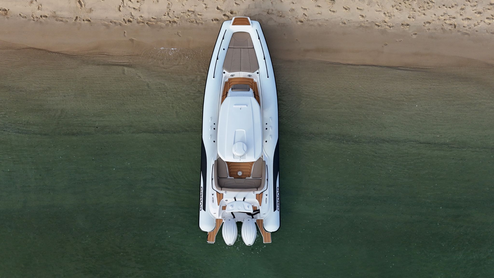 Grand G850 White rigid inflatable boat for sale on the beach in the Gold Coast