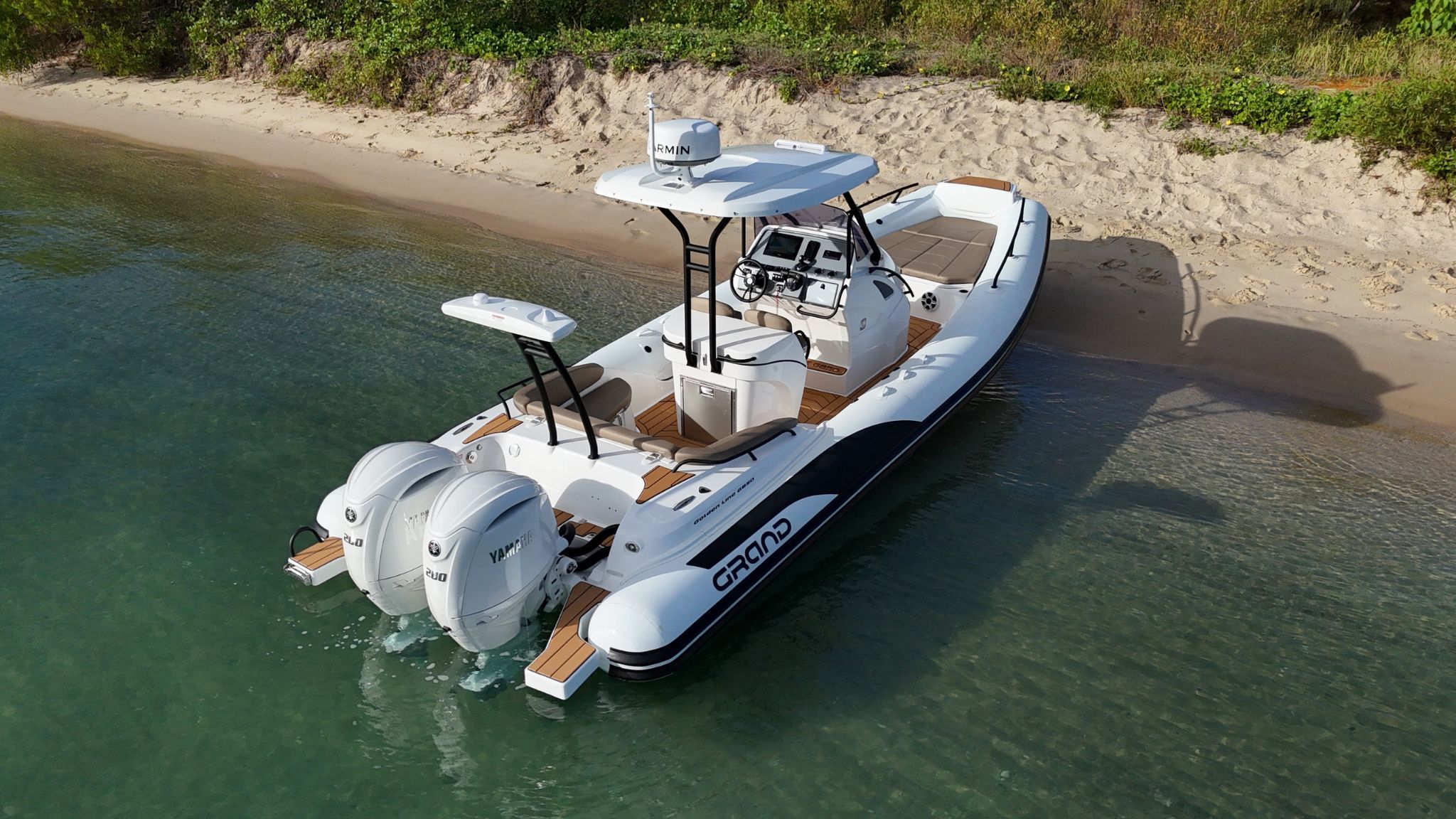 Grand G850 White rigid inflatable boat for sale on the beach in the Gold Coast