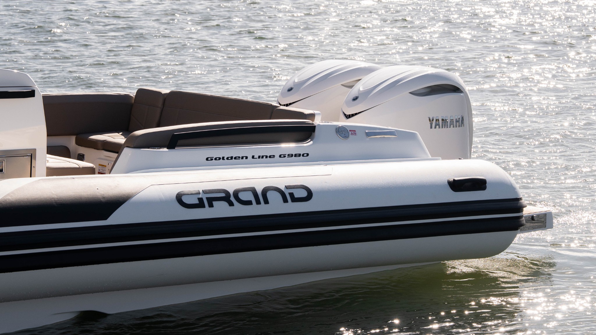 Grand G980 10 metre rigid inflatable boat on beach in Australia
