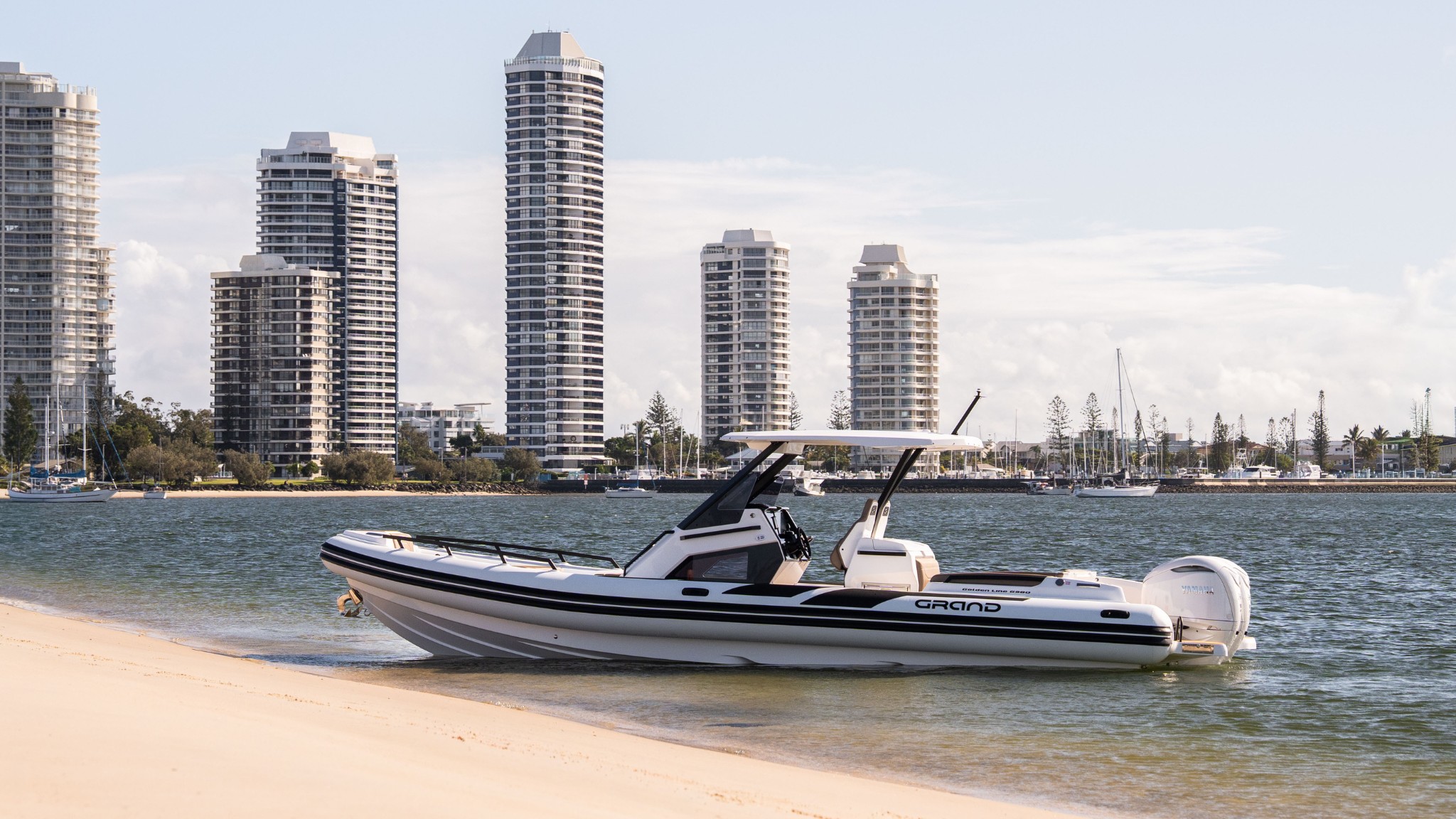 Grand G980 10 metre rigid inflatable boat on beach in Australia