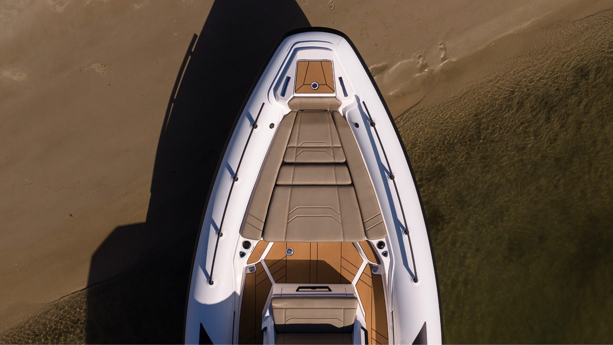 Grand G980 10 metre rigid inflatable boat on beach in Australia