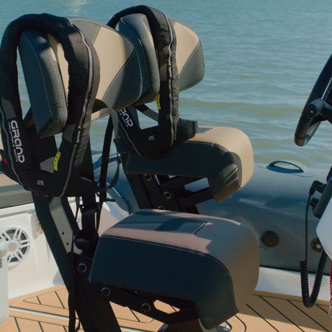 Two jockey seats on the Grand D600 for sale with lifejackets on them