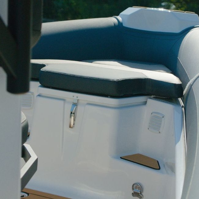 The bow of the Grand D600 for sale, showing the deep locker space under the bow sun bed seating area