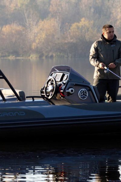 A man dishing off the Grand G500 rigid inflatable boat