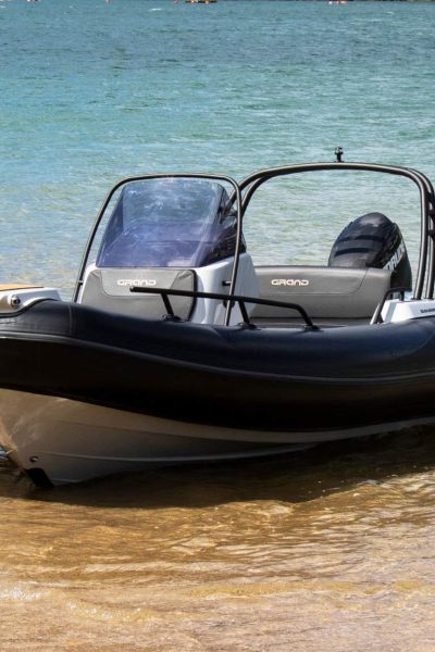 A Grand G500 boat sat on the sand